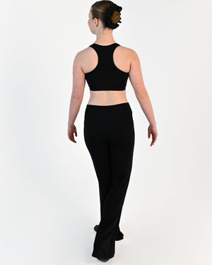 Young dancer wearing the Avery racerback dance crop top in Black, alternate view