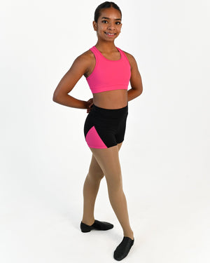 Young dancer wearing the Avery racerback dance crop top in Hot Pink