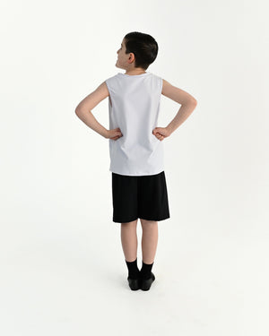 Young dancer wearing the Essential Boys Casual Dance Shorts in Black, alternate view