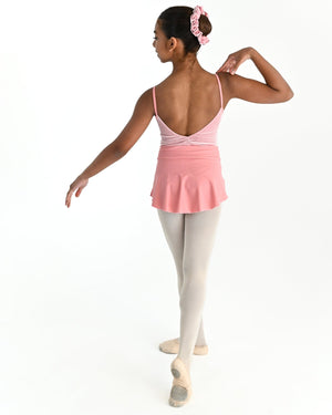 Young dancer wearing the Prima high low pull on ballet skirt in Blush, alternate view