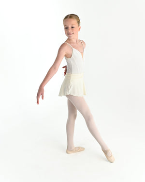 Young dancer wearing the Prima high low pull on ballet skirt in Ivory