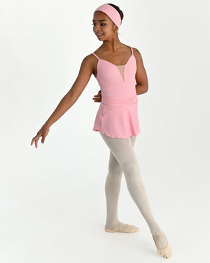 Young dancer wearing the Prima high low pull on ballet skirt in Pink