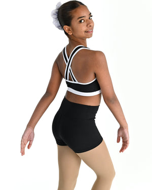 Young dancer wearing the Violet crossed back dance crop top with contrast binding in White, alternate view