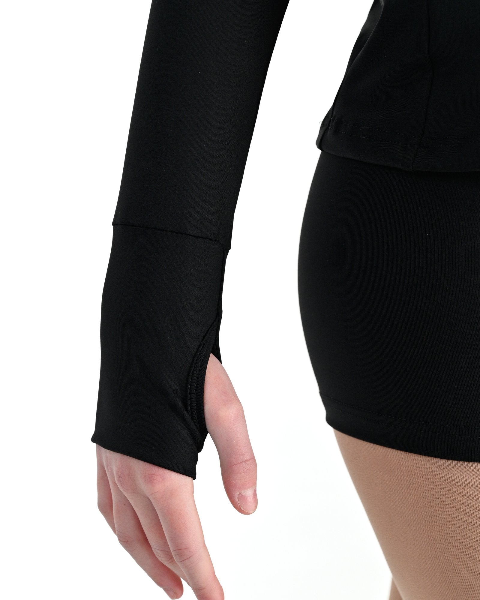 Young dancer wearing the Academy fitted zip front warm up dance jacket in Black, alternate view