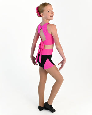 Young dancer wearing the Aura tie back dance crop top in Electric Pink, alternate view