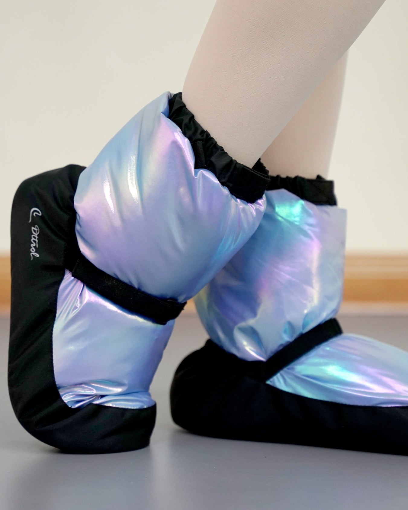Purple aurora iridescent warm up dance booties in dance studio