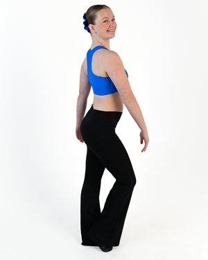 Young dancer wearing the Avery racerback dance crop top in Electric Blue, alternate view
