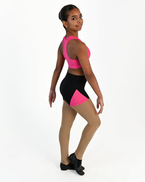 Young dancer wearing the Avery racerback dance crop top in Hot Pink, alternate view