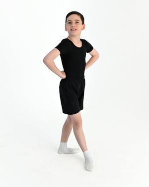 Young dancer wearing the Essential Boys Short Sleeve Leotard in Black