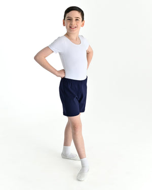 Young dancer wearing the Essential Boys Short Sleeve Leotard in White