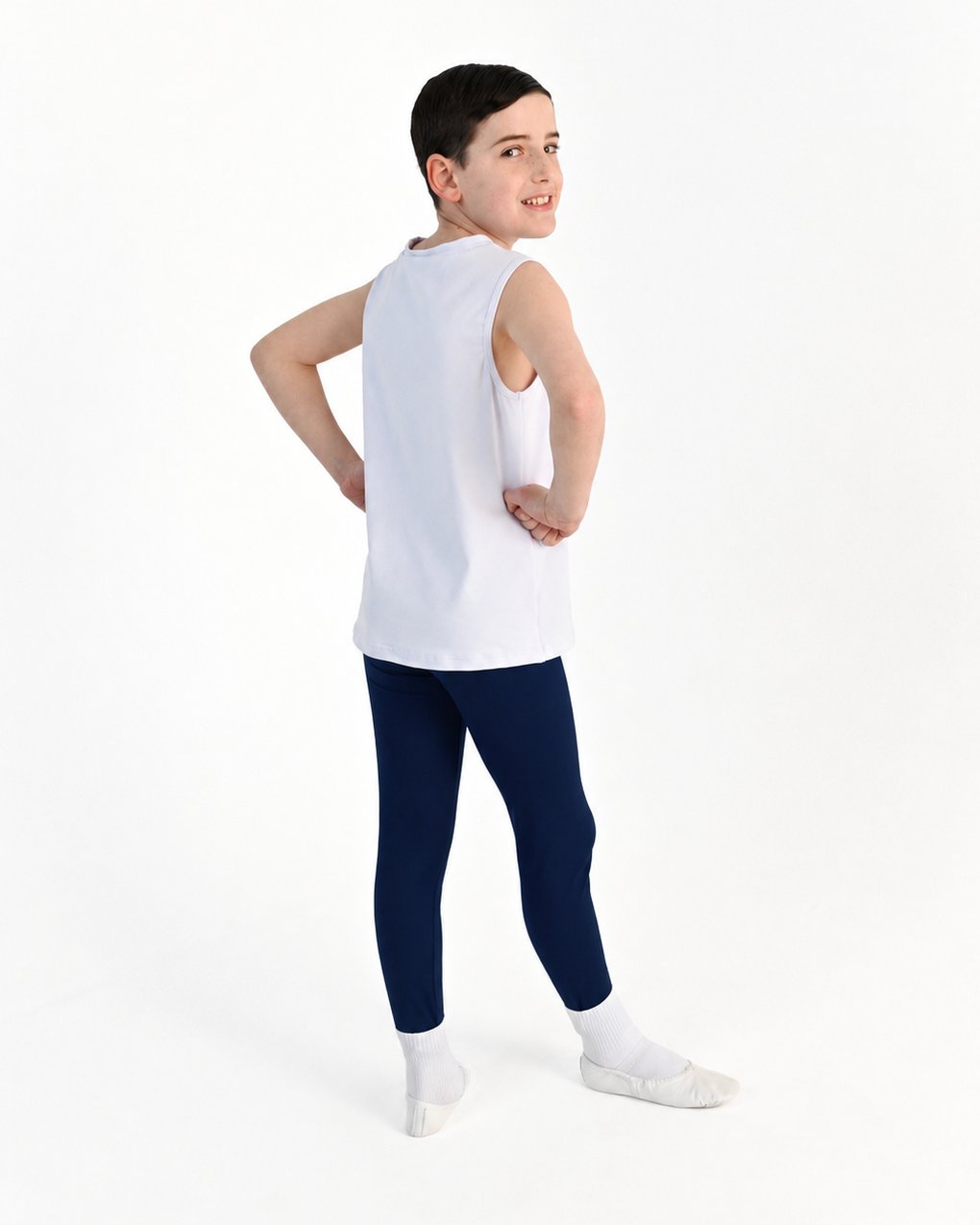 Young dancer wearing the Essential Boys Dance Leggings in Navy, alternate view