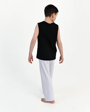 Young dancer wearing the Essential Boys Dance Tank in Black, alternate view