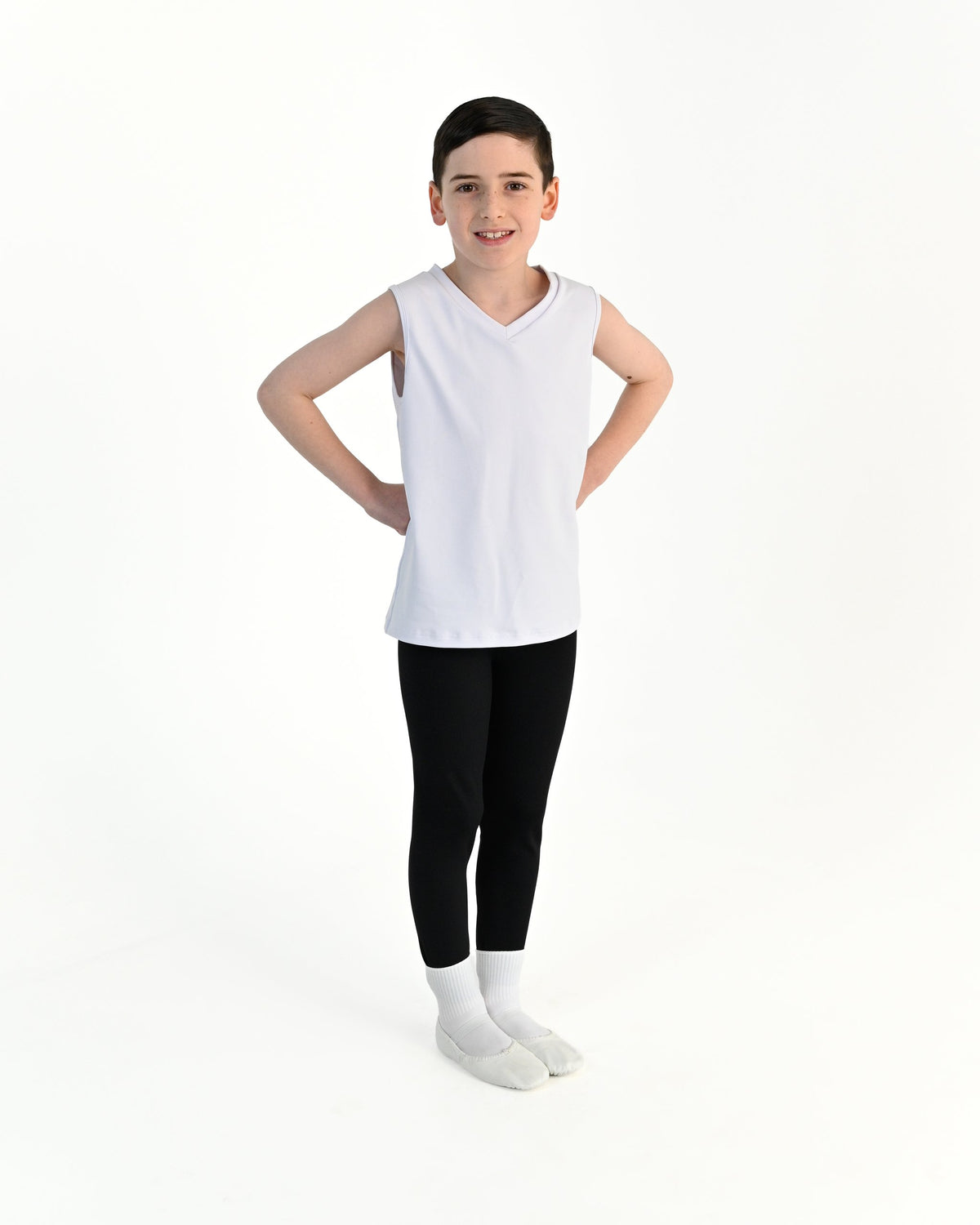 Young dancer wearing the Essential Boys Dance Tank in White