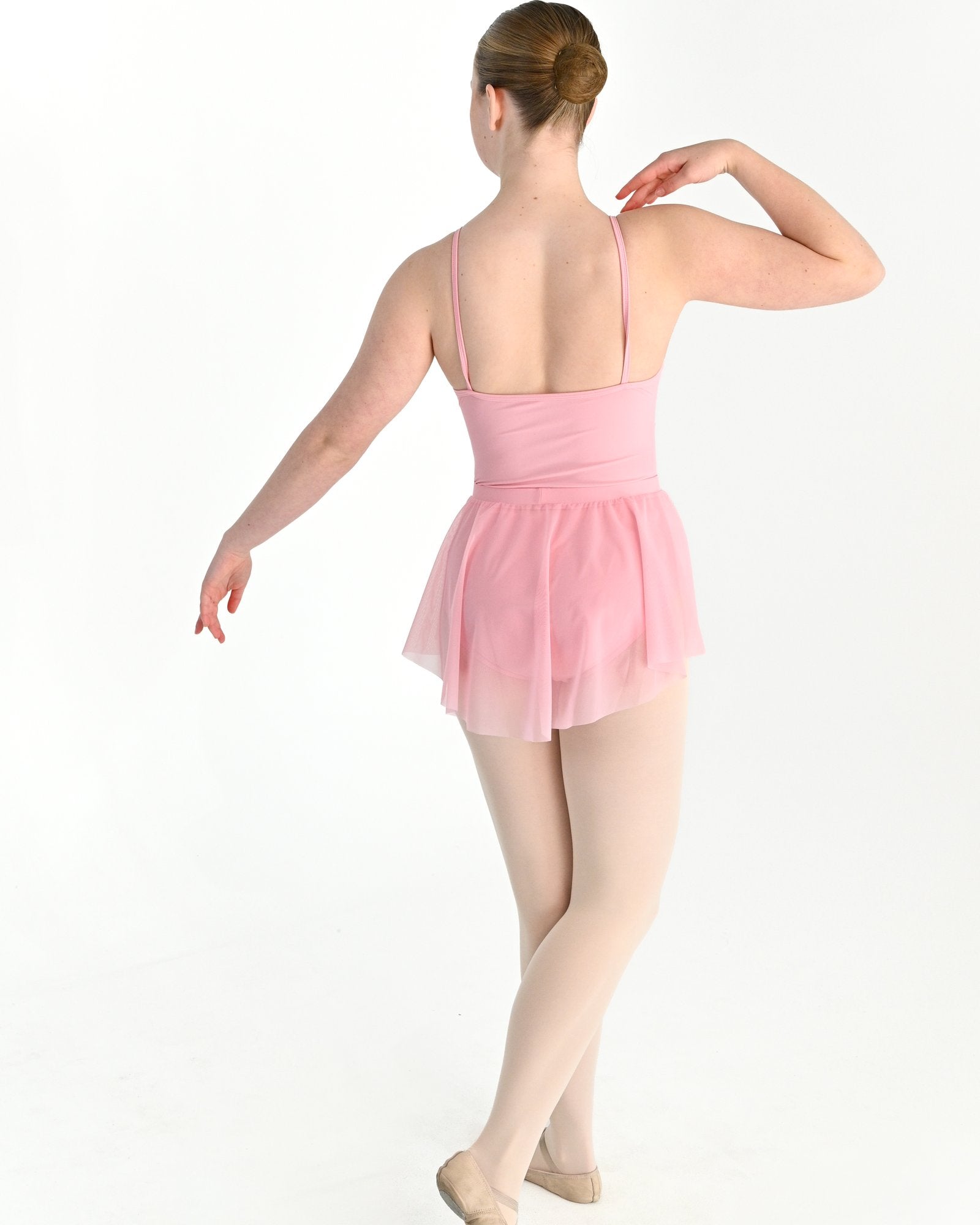 Young dancer wearing the Estelle stretch mesh pull on ballet skirt in Pink, alternate view
