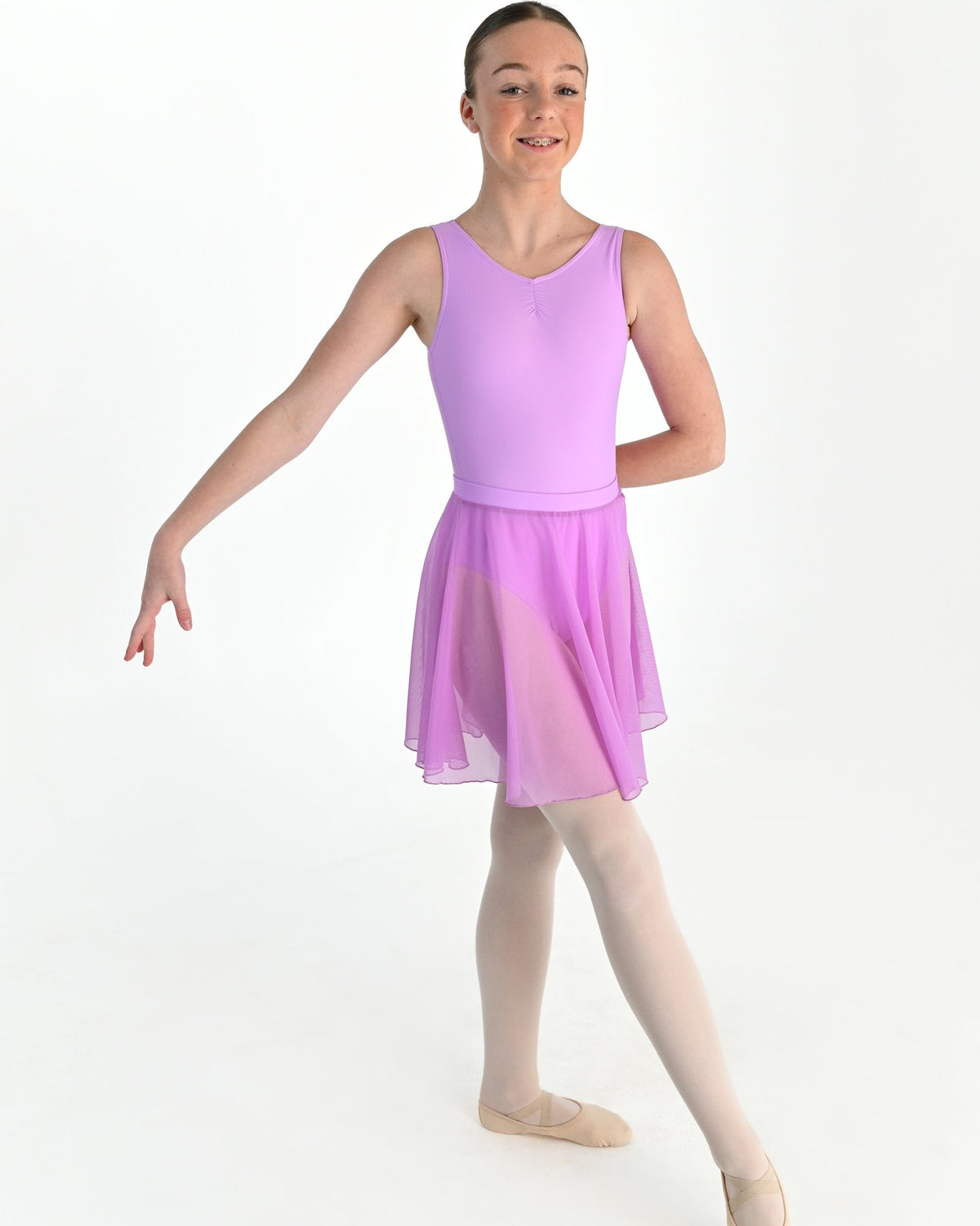 Young dancer wearing the Julietta Chiffon Circle Skirt in Wisteria
