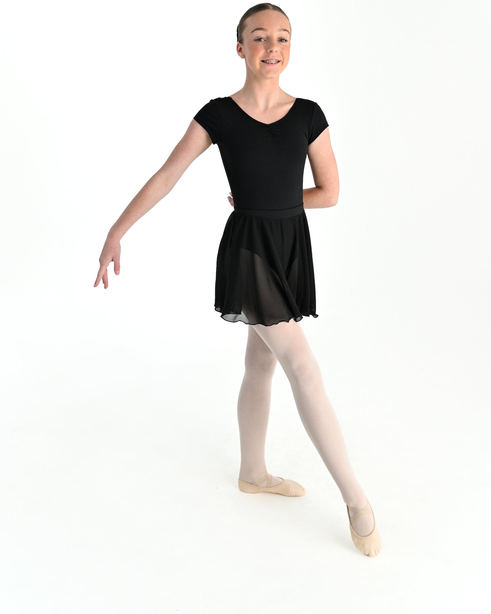 Young dancer wearing the Julietta Chiffon Circle Skirt in Black