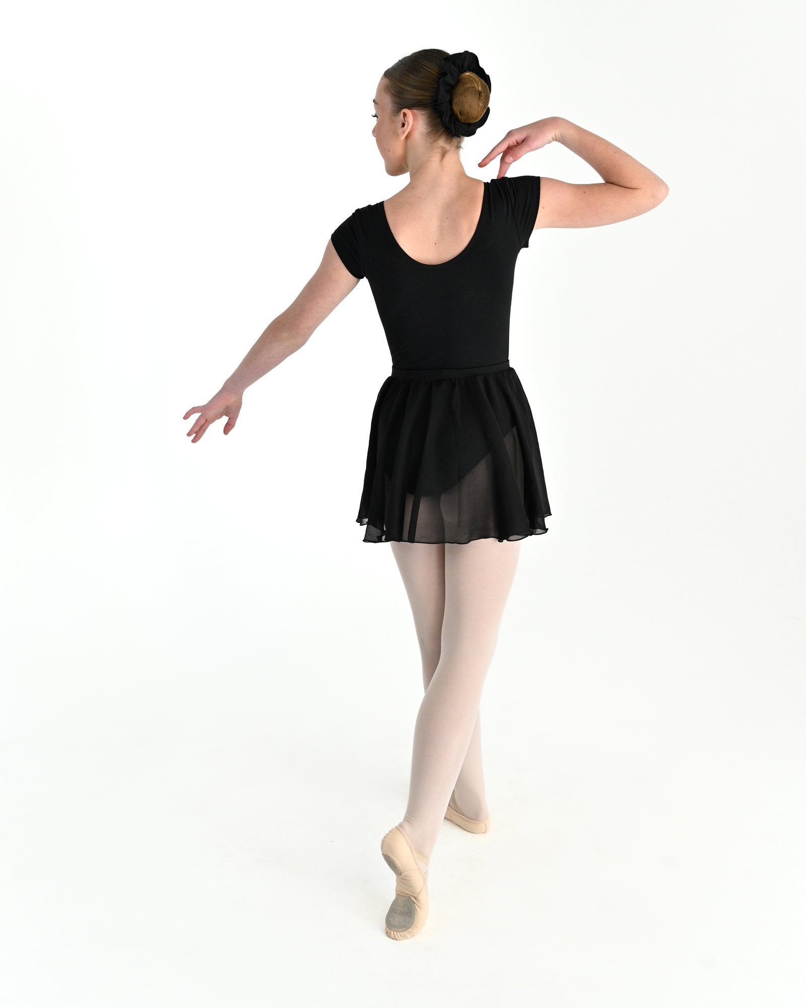 Young dancer wearing the Julietta Chiffon Circle Skirt in Black, alternate view