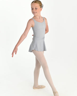 Young dancer wearing the Prima high low pull on ballet skirt in Grey