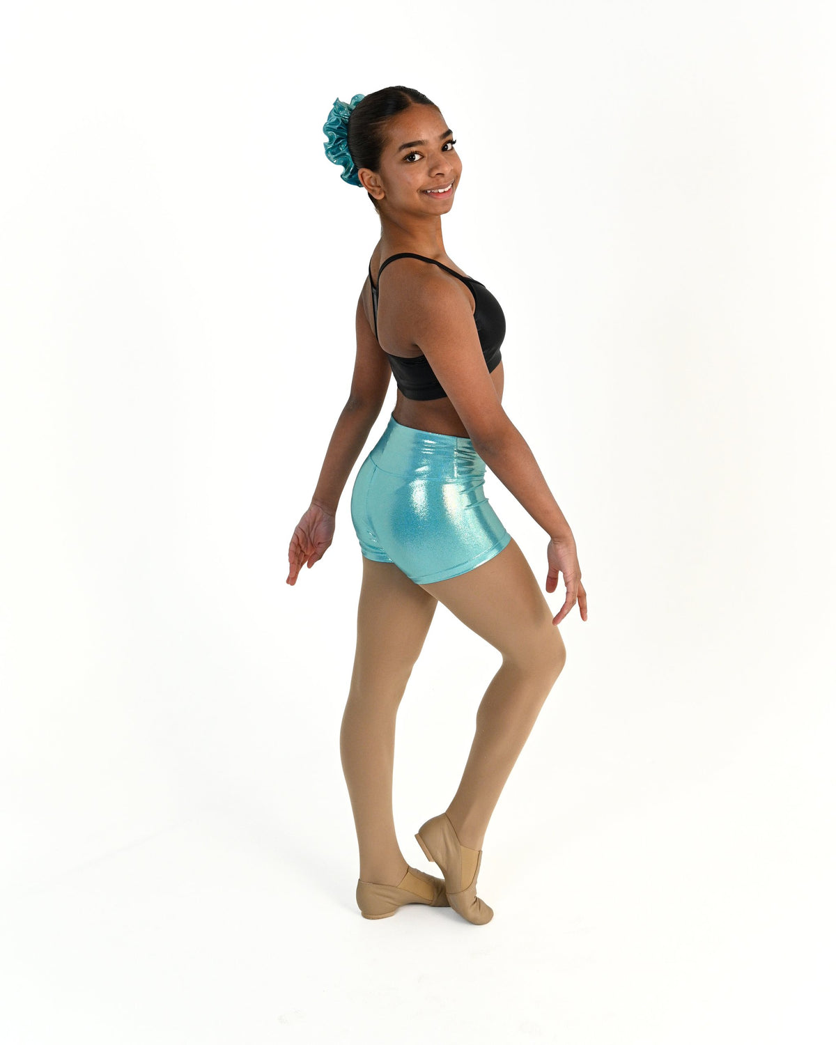 Young dancer wearing the Sienna Shorts in Aqua, alternate view