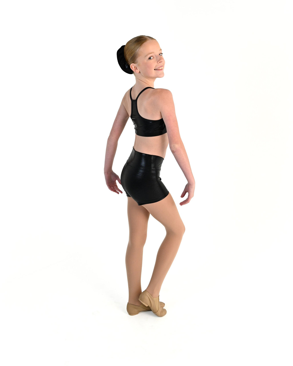 Young dancer wearing the Sienna Shorts in Black, alternate view