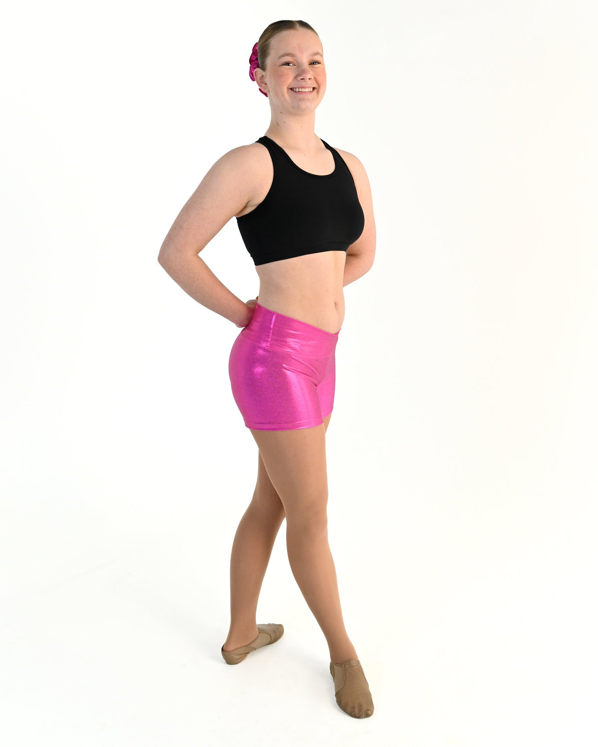 Young dancer wearing the Sienna Shorts in Electric Pink
