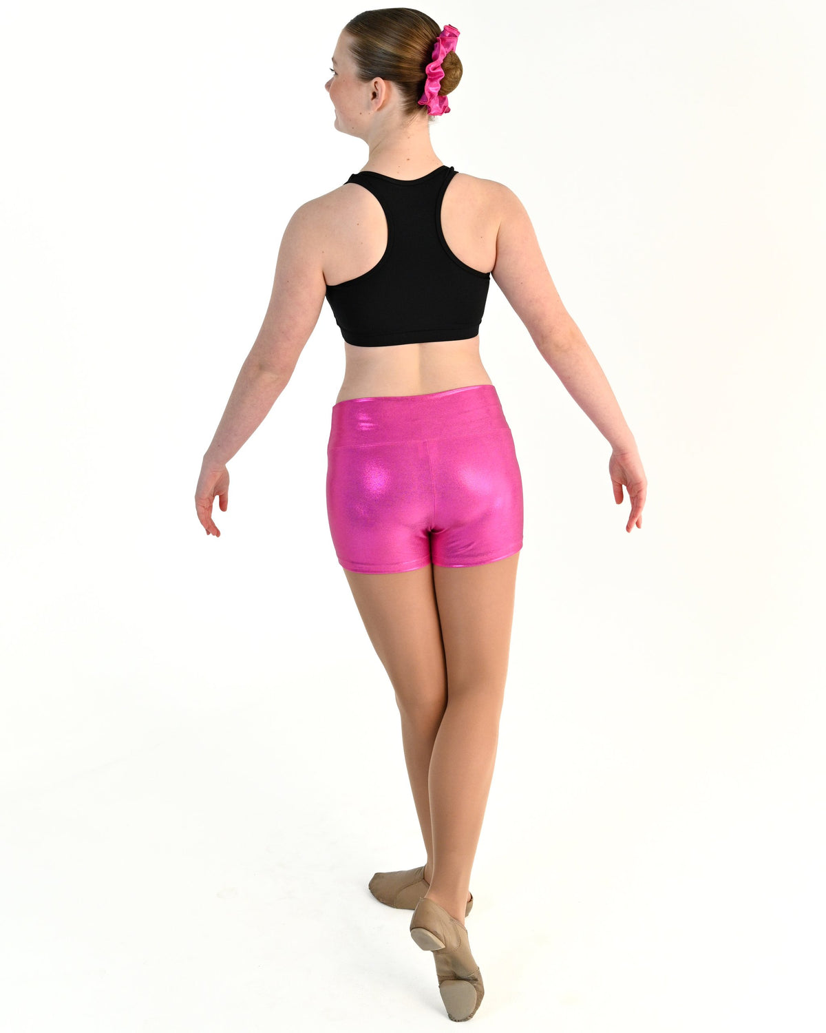 Young dancer wearing the Sienna Shorts in Electric Pink, alternate view