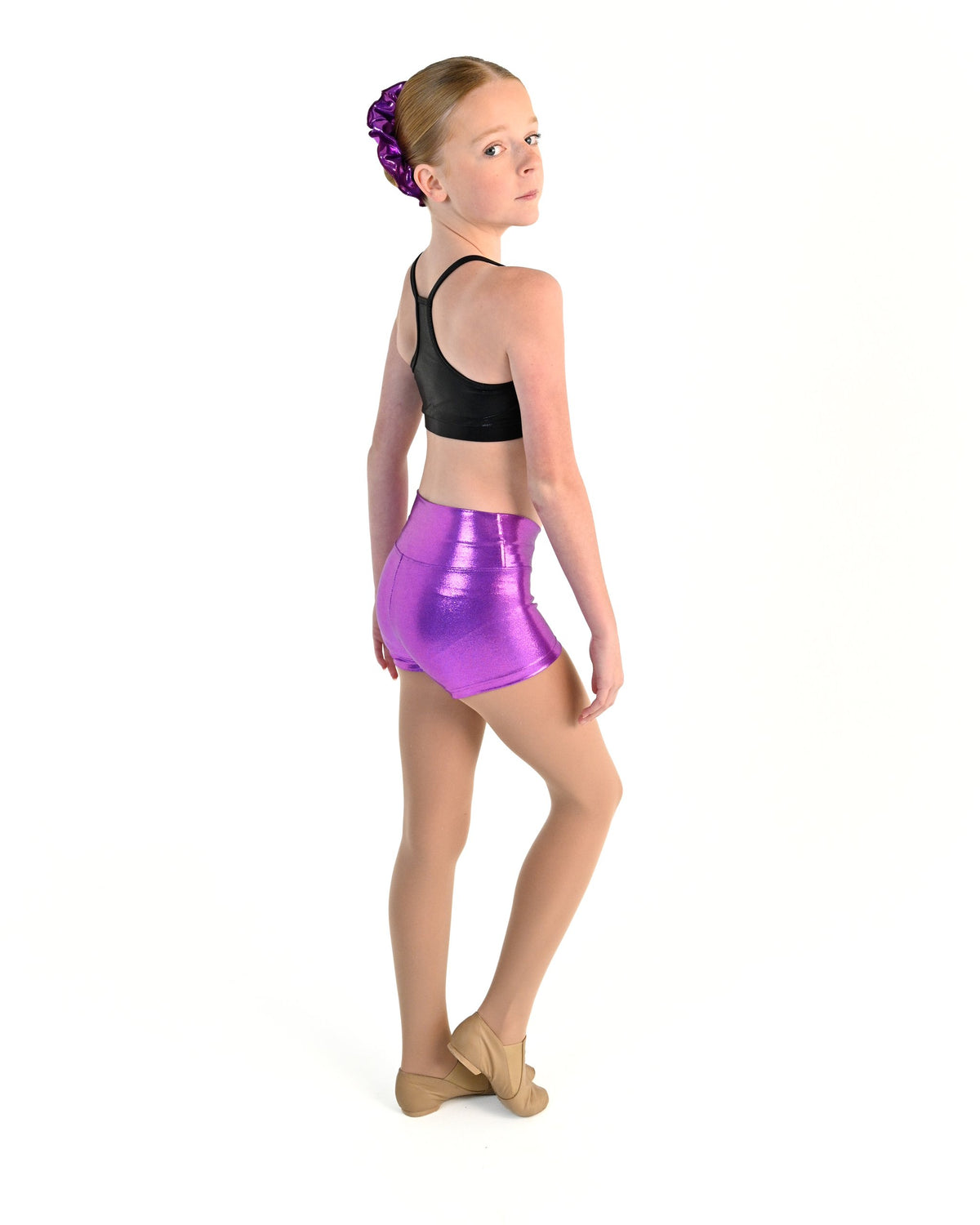 Young dancer wearing the Sienna Shorts in Fuchsia, alternate view