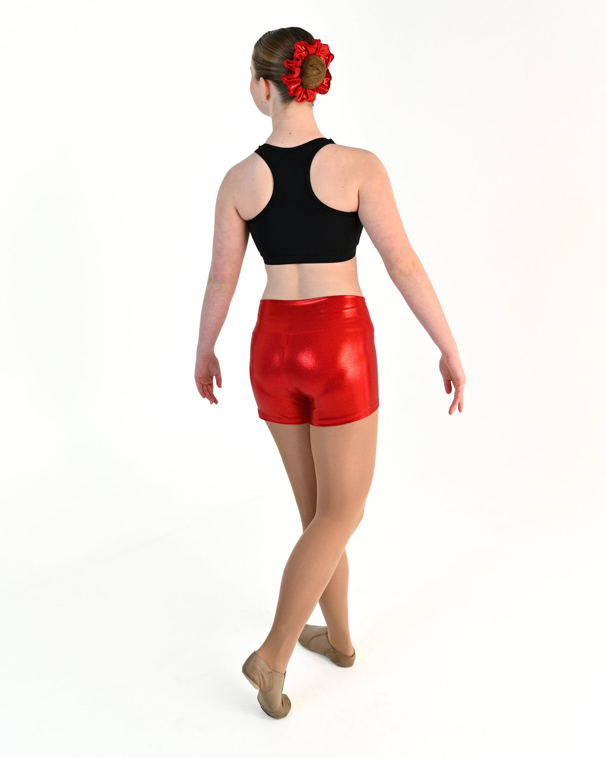 Young dancer wearing the Sienna Shorts in Red, alternate view