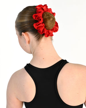 Young dancer wearing the Sienna Scrunchie in Red