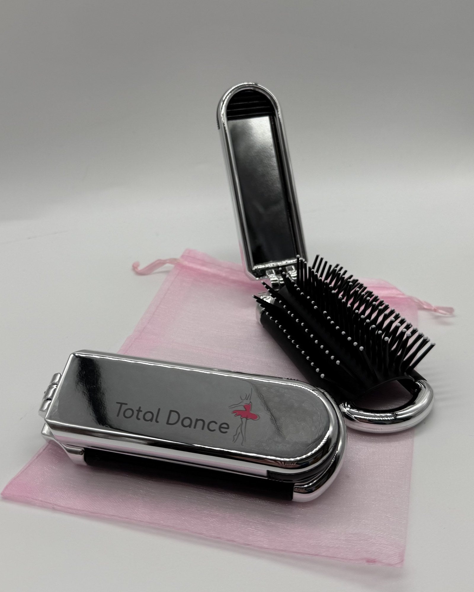 Free Total Dance foldable hair brush with removable mirror, complimentary gift
