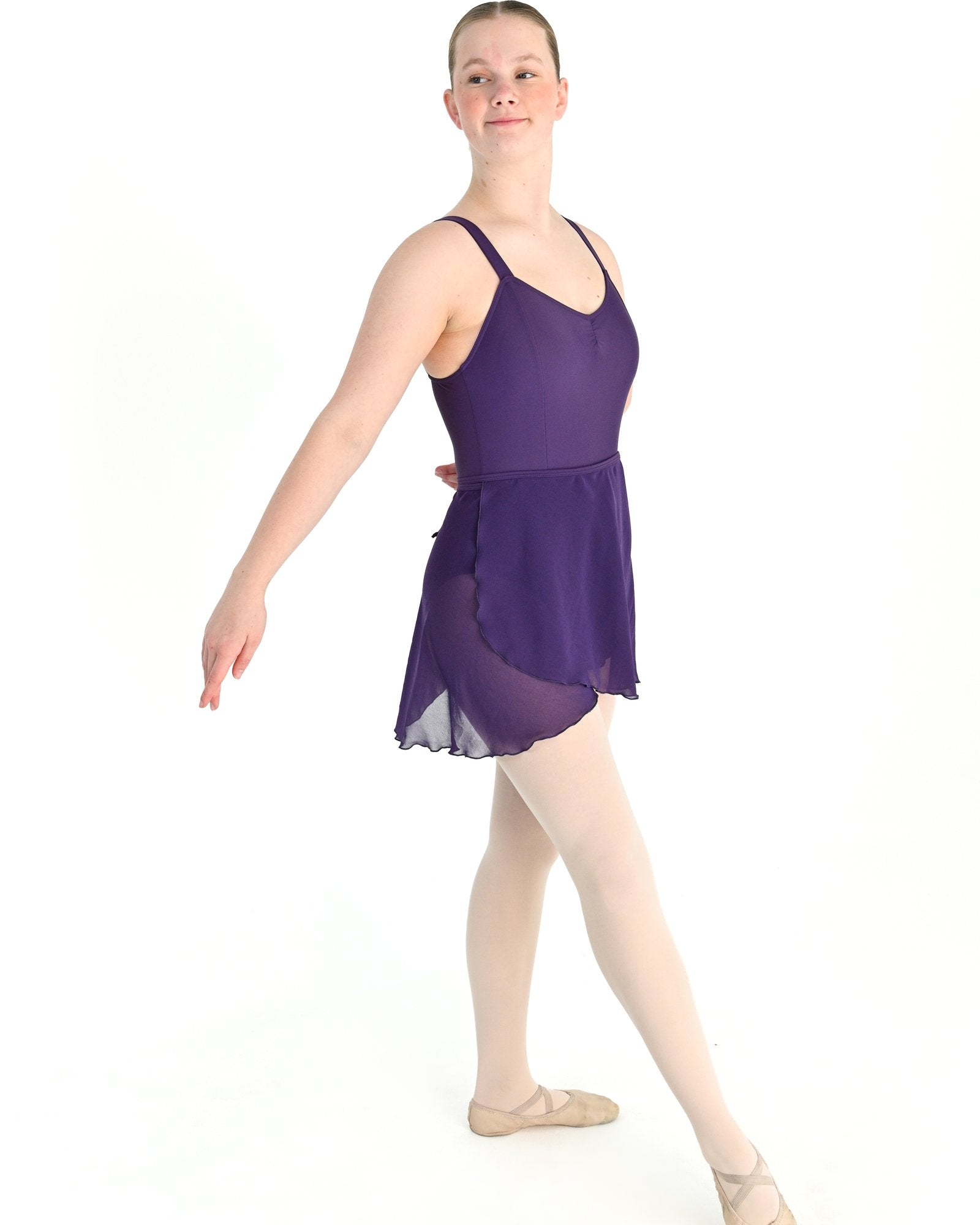 Young dancer wearing the Traditional Georgette Wrap Skirt in Eggplant